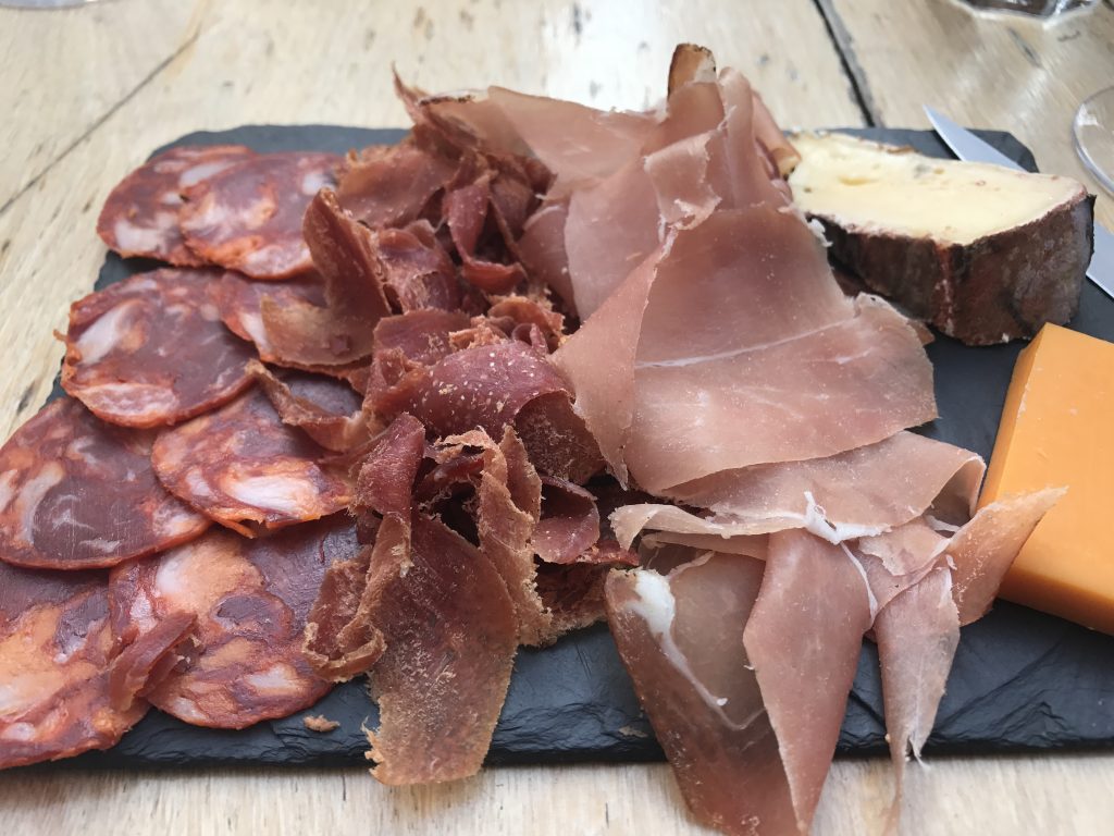 A platter of spread deli meats and cheeses: the cultural backdrop of France